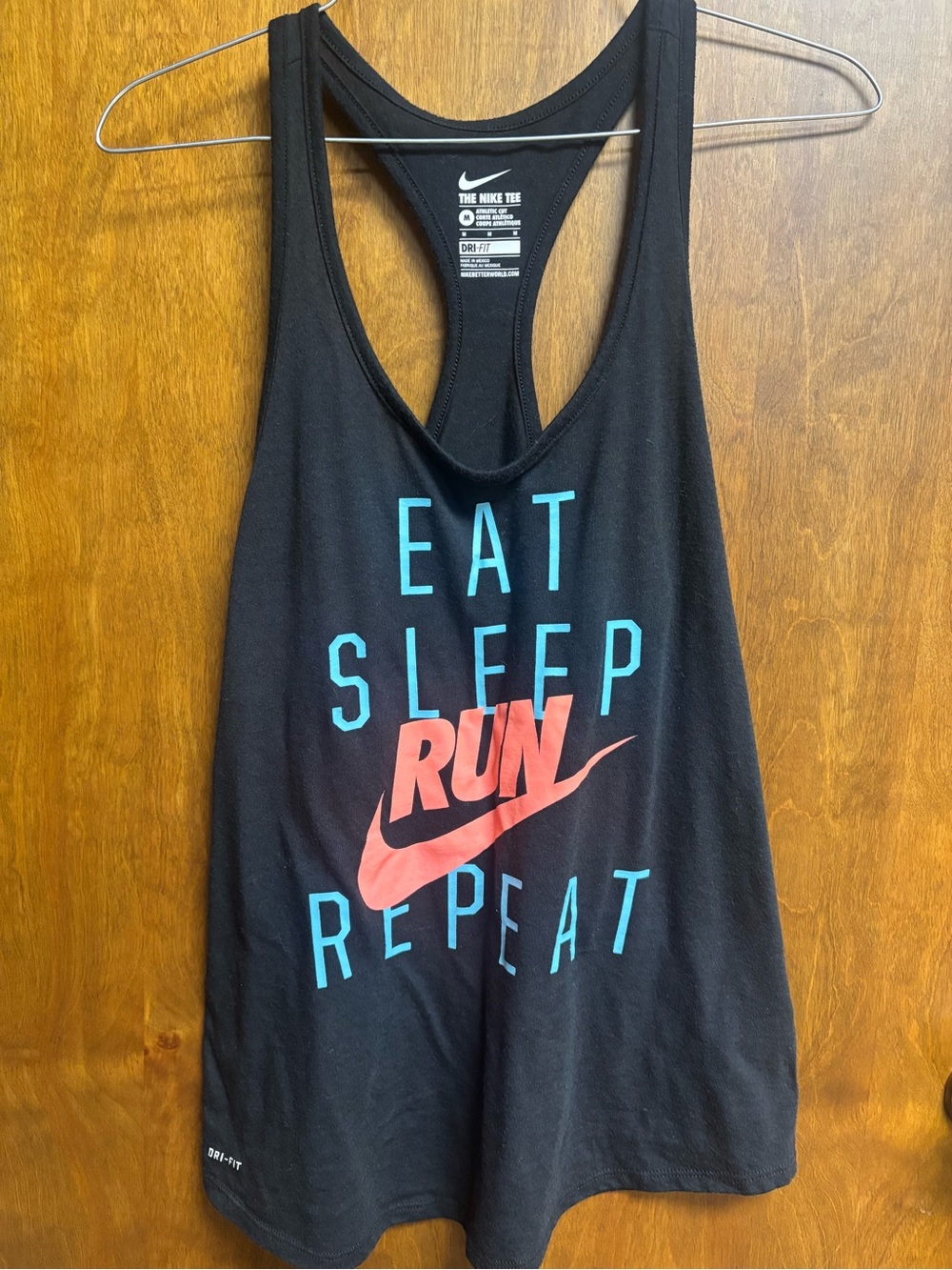 Nike Black Tank with Coral Swoosh & Teal Lettering